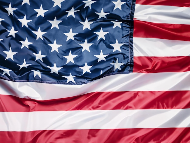 Closeup of an american usa flag with stars and stripes on white plank backdrop