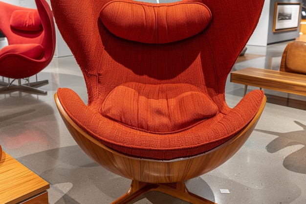 Closeup of an armless chair with a concave back