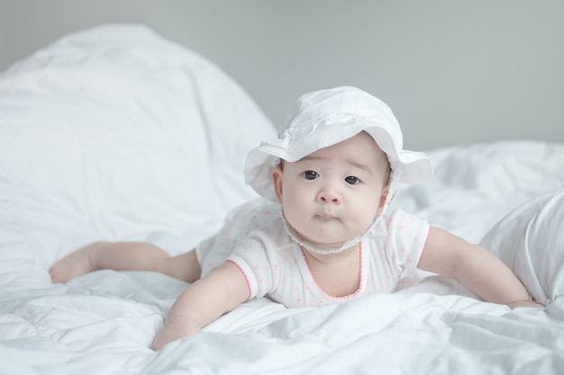 Closeup asian baby girl in cute motion