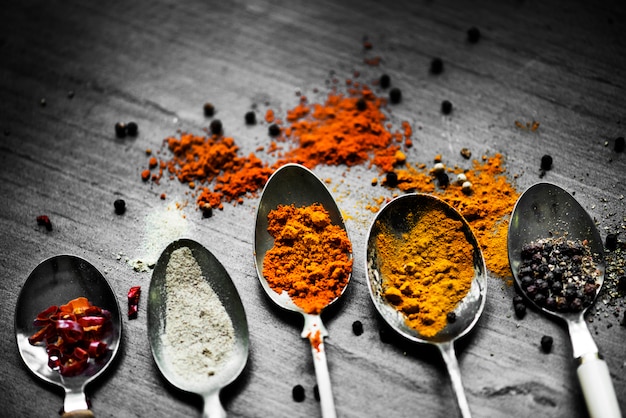 Photo closeup of asian spice powders cooking ingredients