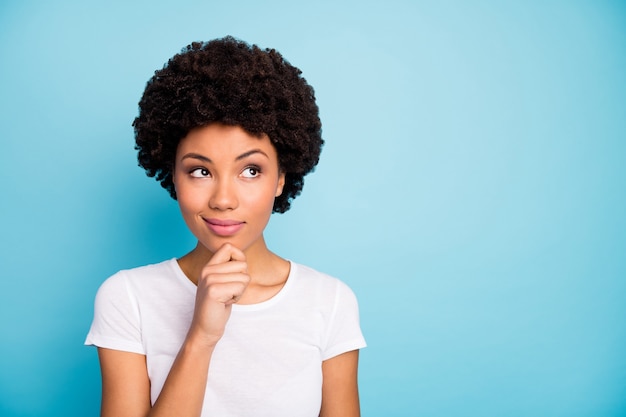 Closeup attractive dark skin curly lady looking wondered