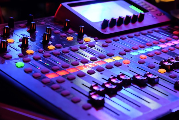 Photo closeup of an audio mixing control panel