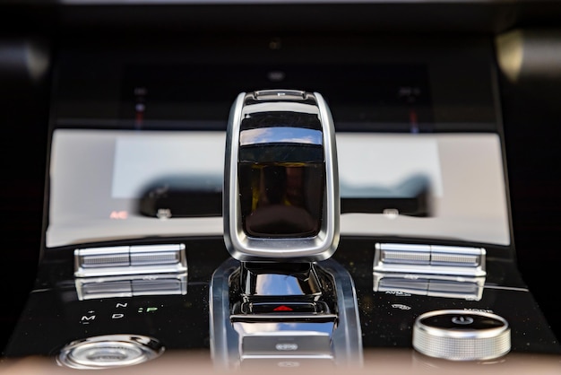 Closeup of an automatic transmission Gearstick of a modern premium car no people interior of a premium car