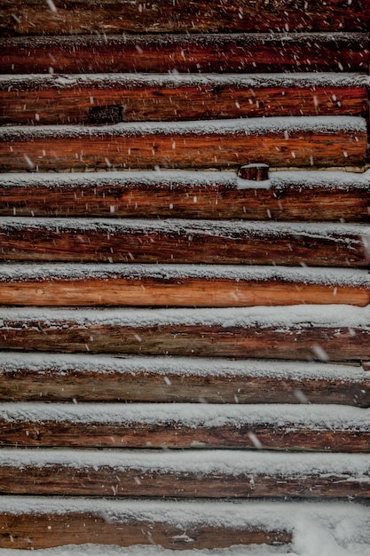 Closeup background of old wood planks under snow