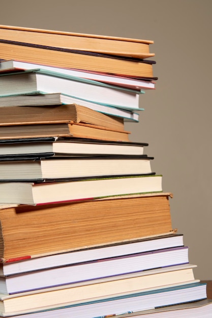 Closeup of background stack of old used books Pile of vintage old books Back to school copy space