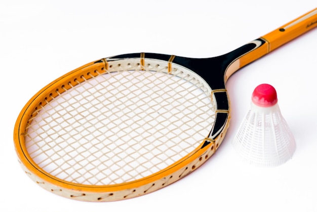 Closeup Badminton racket and shuttlecock isolated on white