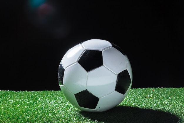 Closeup of ball on the green grass.