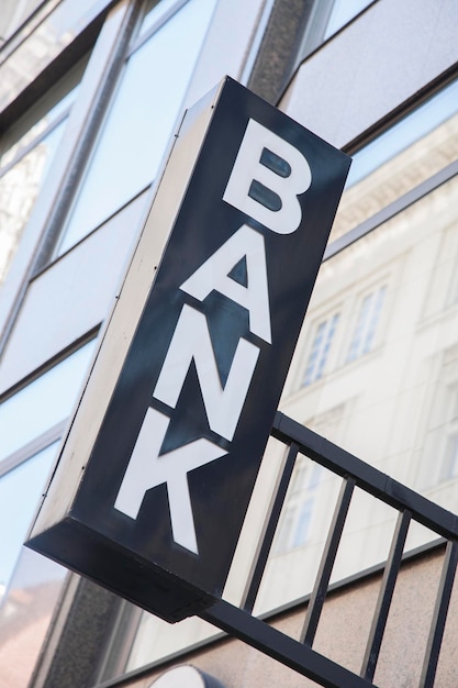 Closeup of Bank Sign on Building Facade