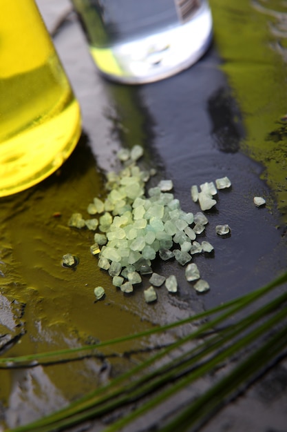 Closeup of bath salt on wet slate