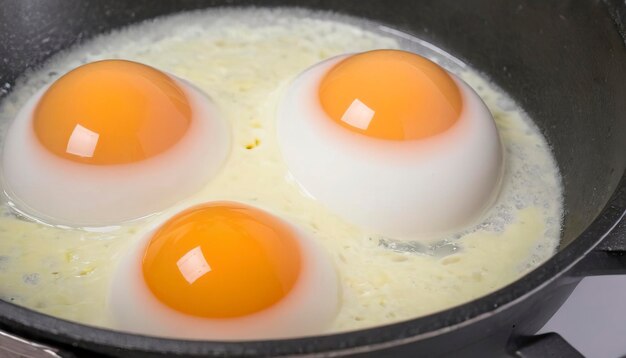 Photo closeup of beated eggs preparing to be cooked