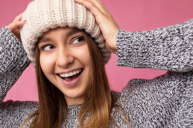 Closeup beautiful happy surprised young dark blonde woman