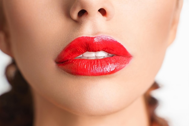 Closeup beautiful lips sexy plump lips which red lipstick