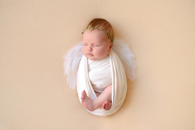 Closeup beautiful sleeping baby girl Newborn baby girl asleep on a blanket