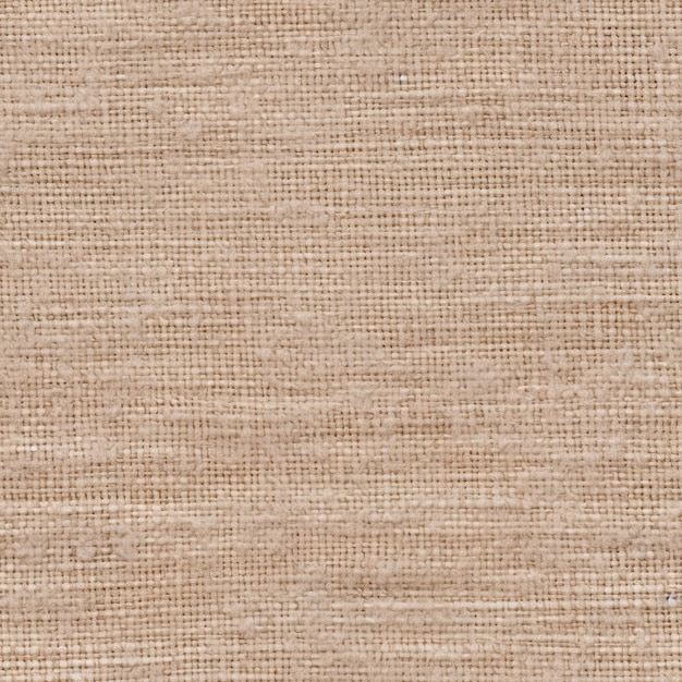 Closeup of a beige denim texture with a neutral pattern