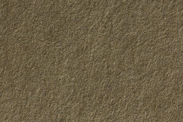 Closeup of beige paper texture background High resolution photo