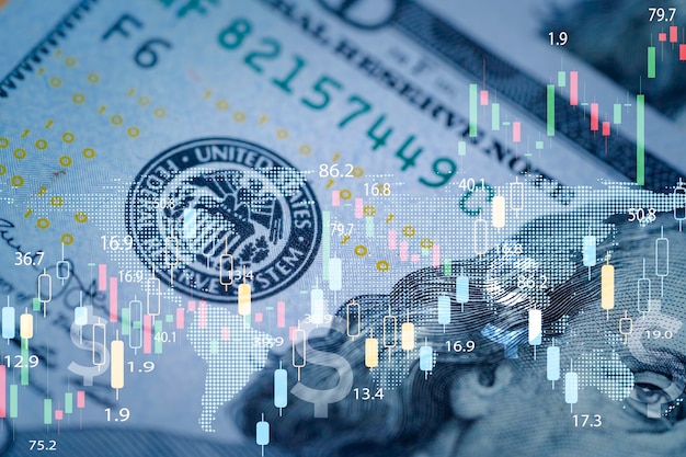 Closeup Benjamin Franklin face on USD banknote with stock market chart graph for currency exchange and global trade forex concept