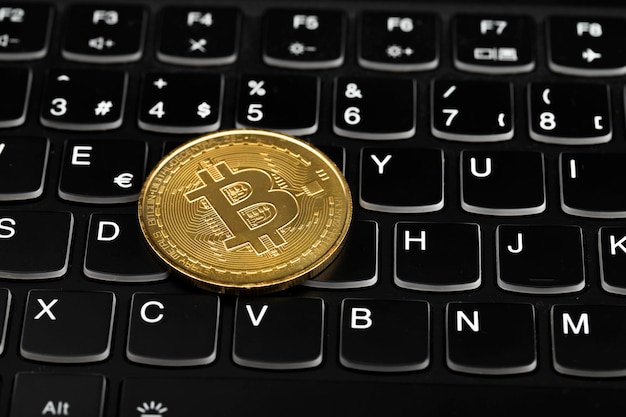 Closeup of bitcoin on the computer keyboard
