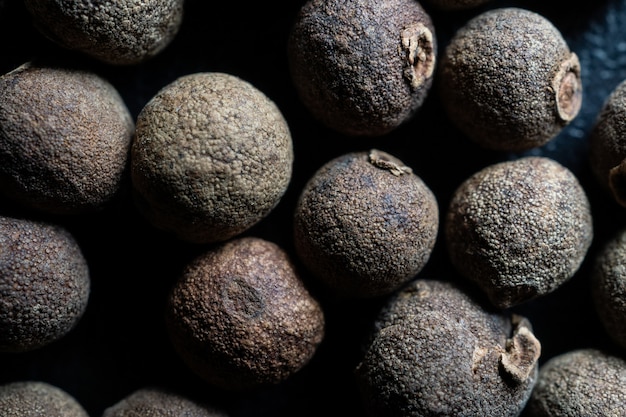 Closeup black peppercorns