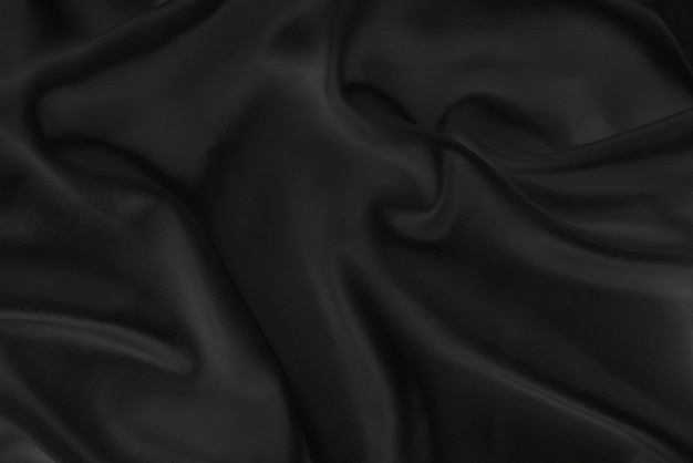 Premium Photo | Closeup of black smoot fabric as a background.