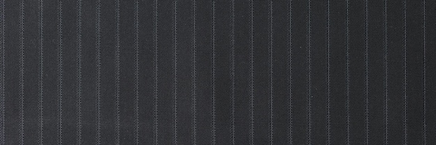 Closeup of black striped fabric textured background for design art work pattern of smooth cloth