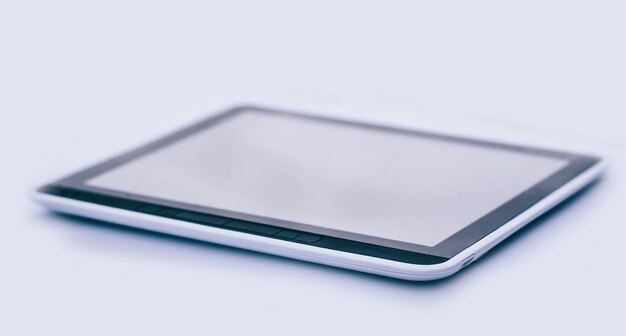 Closeup black tablet pc isolated on a black background