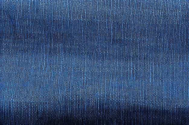 Photo closeup of blue fabric texture for background