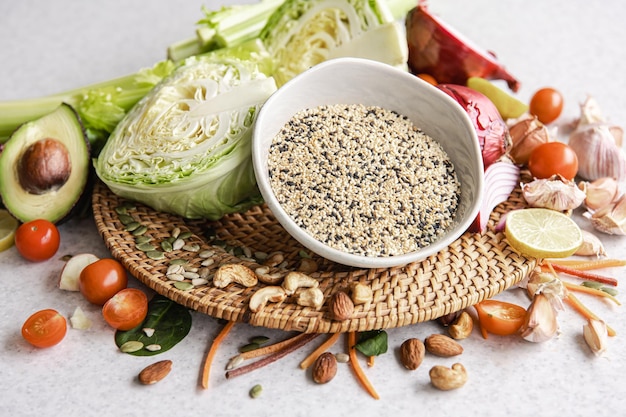 Closeup a bowl of chia seeds and other healthy foods on the kitchen table