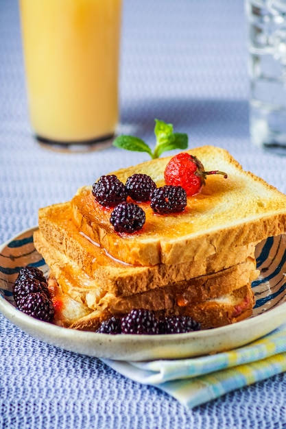 Closeup of bread toasts with fresh berry