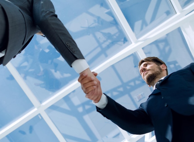 Closeup of business people handshaking