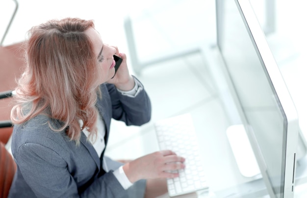 Closeup business woman talking on smartphone