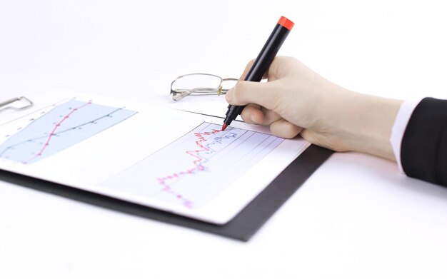 Closeup business woman working with a marketing schedule