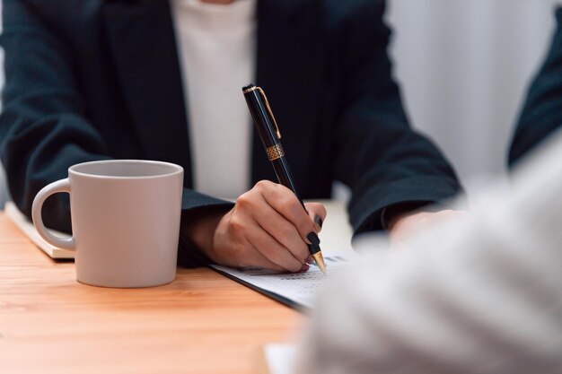 Closeup businesswoman analyzing financial paper at harmony office workplace