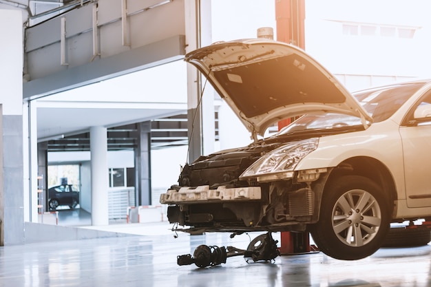 Closeup car in repair station and body shop