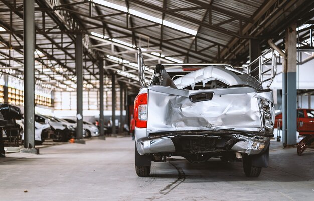 Photo closeup car in repair station and body shop