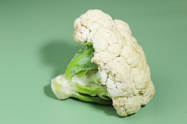 Closeup of Cauliflower on a green background