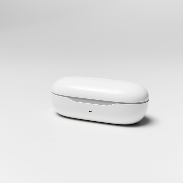 Closeup of charger case for wireless earphones on white studio background