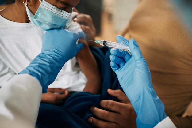 Closeup of child vaccination due to coronavirus pandemic