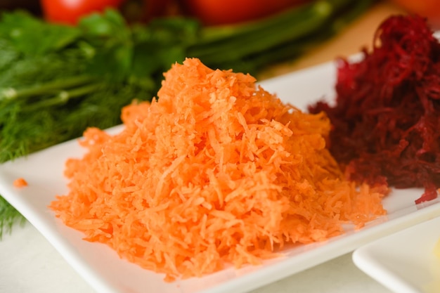 Closeup of chopped carrot for making traditional Ukrainian borscht