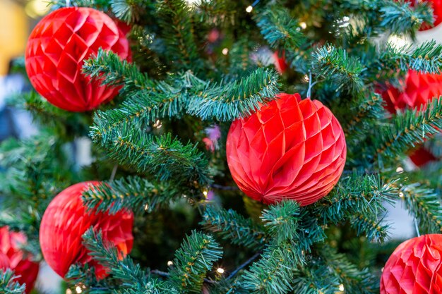 Closeup on Christmas tree decoration over festive background