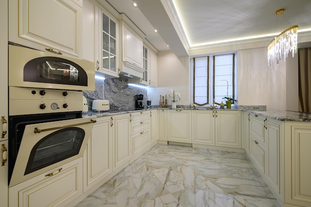 https://img.freepik.com/premium-photo/closeup-classic-creamcolored-kitchen_97070-3733.jpg?size=626&ext=jpg