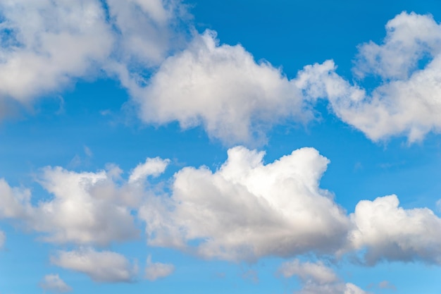 Closeup of clouds on a blue sky above the horizon on a cold autumn day Natural background