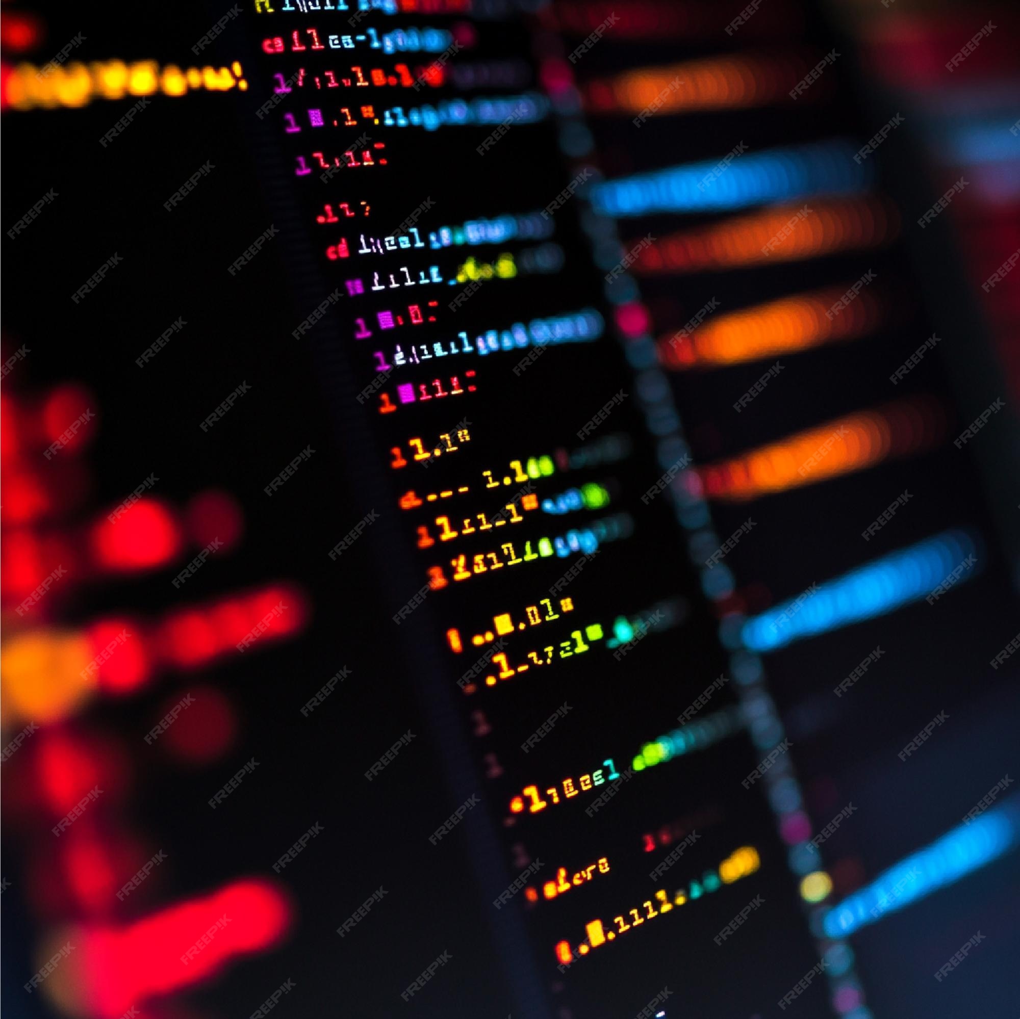 A closeup of code snippets for different programming languages like ...
