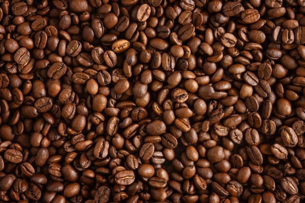 Closeup of coffee beans background. View from above