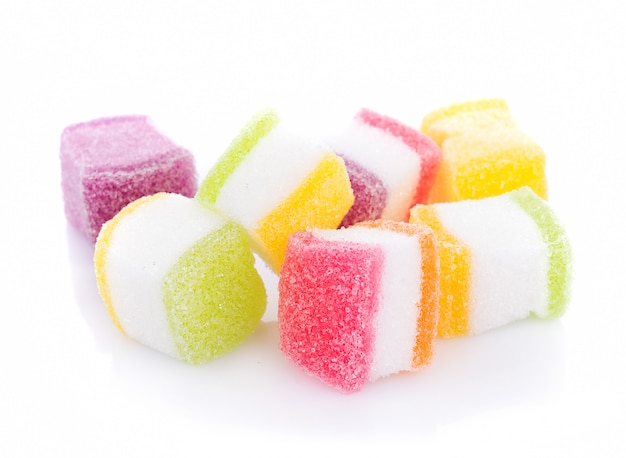 Closeup colorful candy and jelly sweet on white