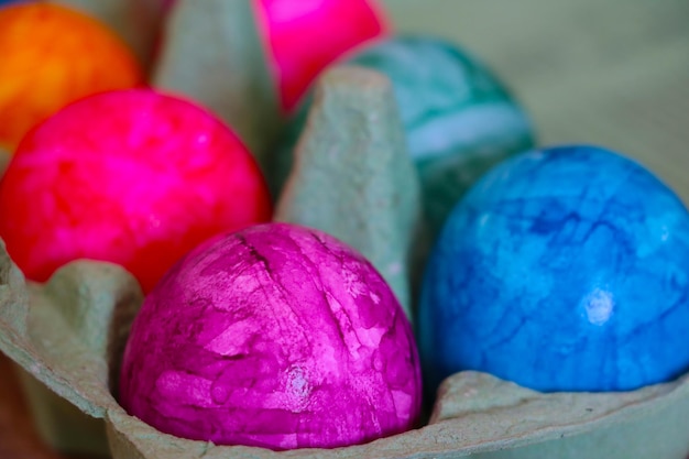 Closeup of colorful Easter eggs in a box