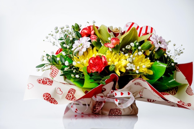 Closeup of colorful spring flowers bouquet on table