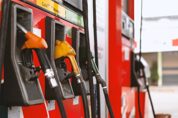 Closeup of colourful fuel pumps at a gas station 