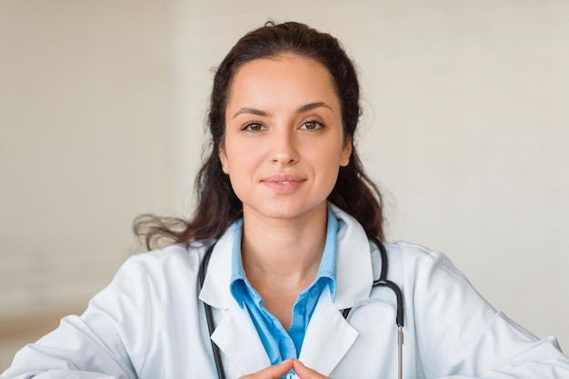 Closeup of confident female doctor with stethoscope