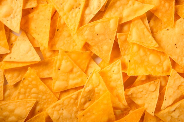 Photo a closeup of crispy golden nacho chips