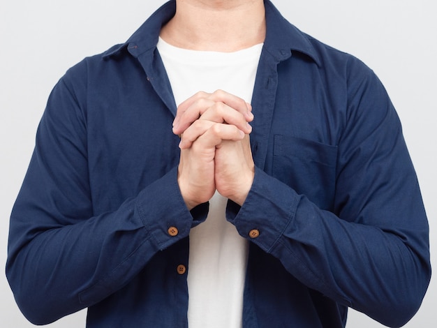 Closeup crop body man hand pray portrait white background